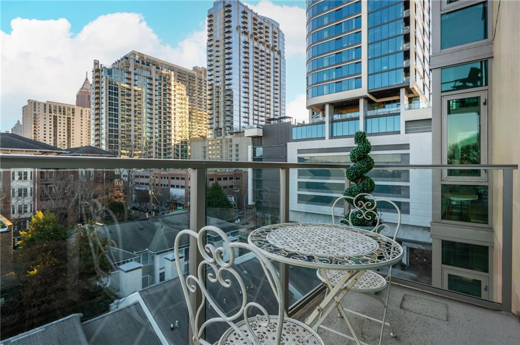 905 Juniper Street Northeast, Unit 705 Atlanta, GA 30309 - Photo 36 of 62 a view of backyard with patio