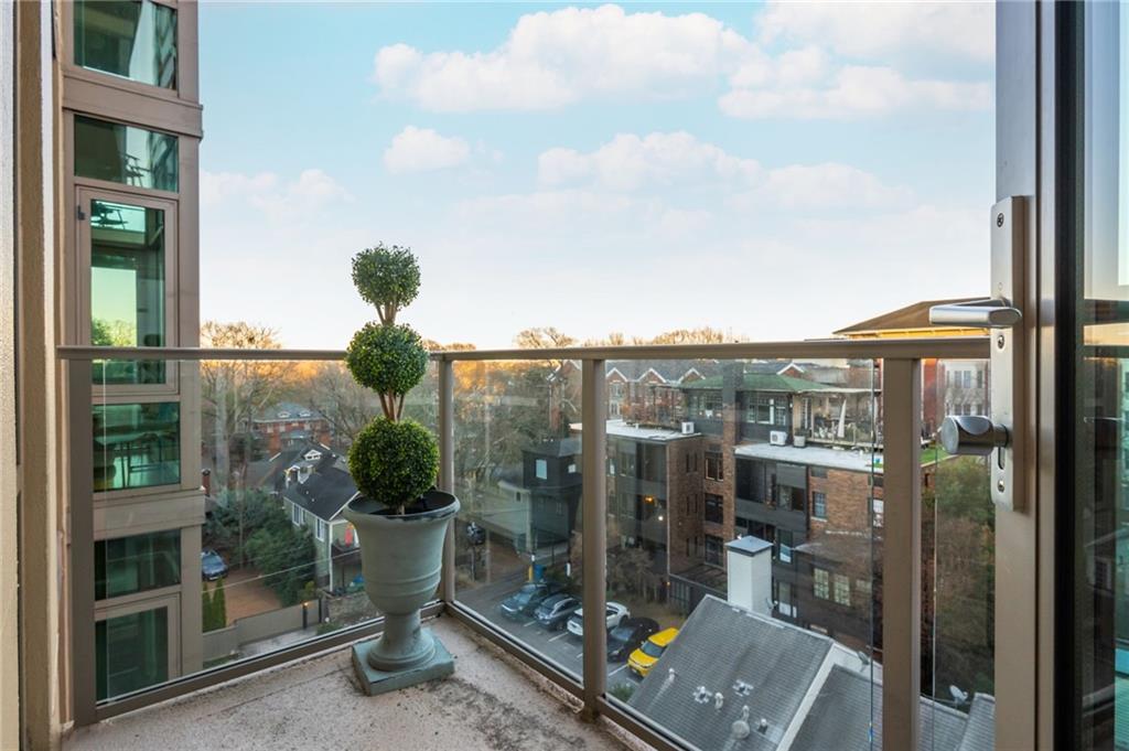 905 Juniper Street Northeast, Unit 705 Atlanta, GA 30309 - Photo 42 of 62 a view of a terrace with seating area