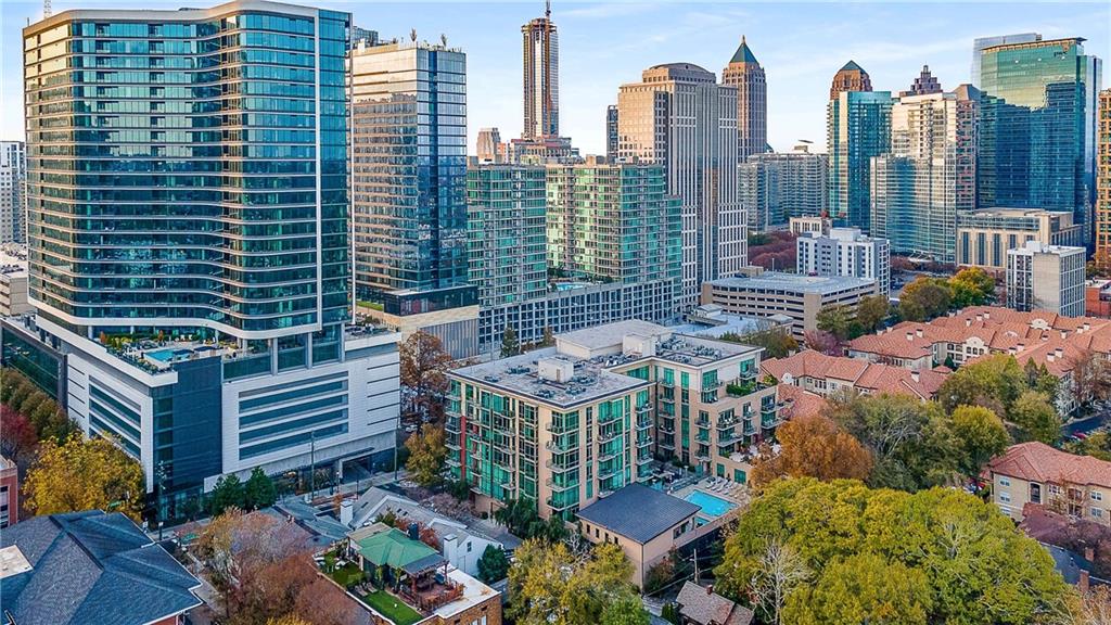 905 Juniper Street Northeast, Unit 705 Atlanta, GA 30309 - Photo 58 of 62 a view of a city with tall buildings