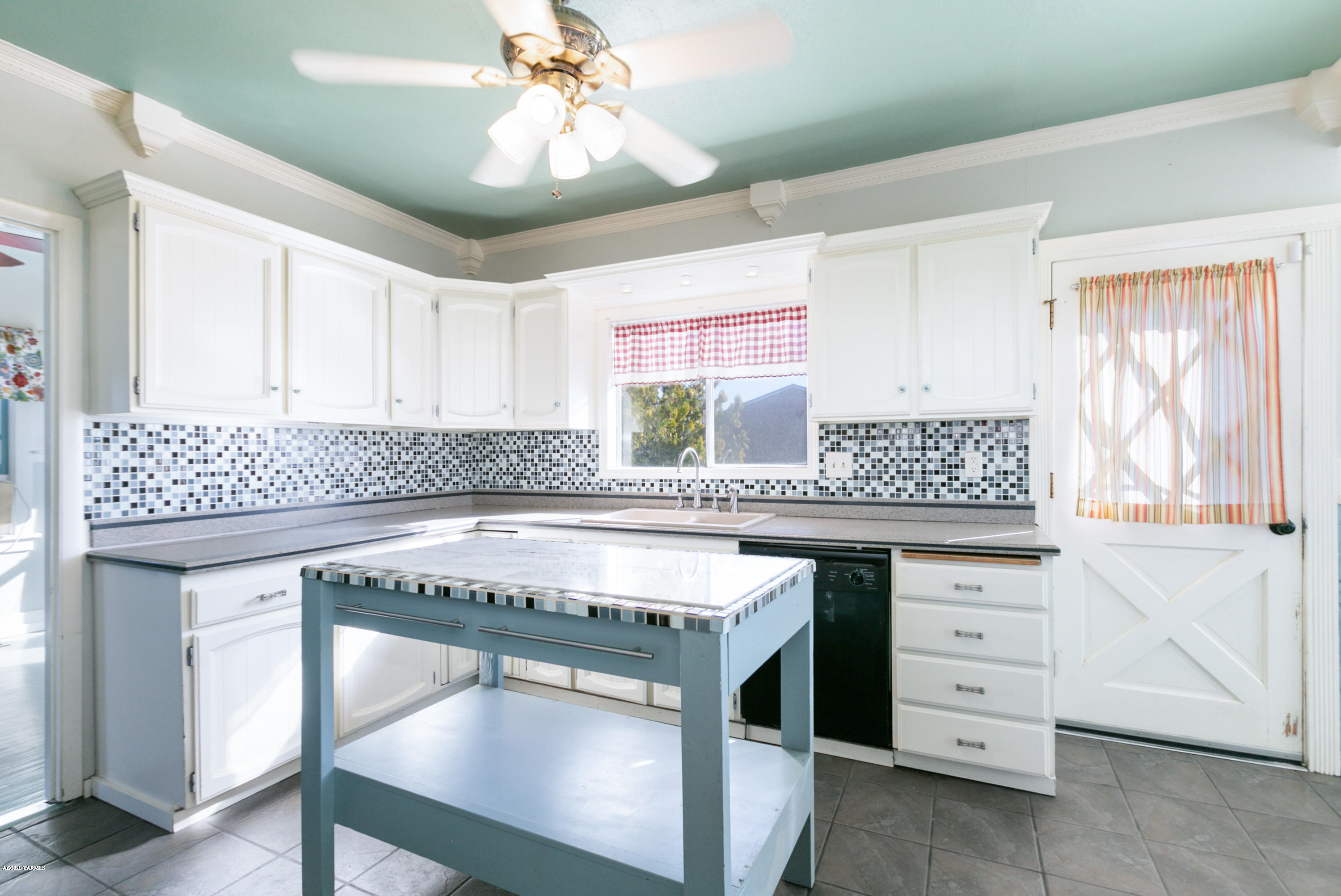 780 Elliott Road Cowiche, WA 98923 - Photo 3 of 18 a kitchen with cabinets appliances and a window