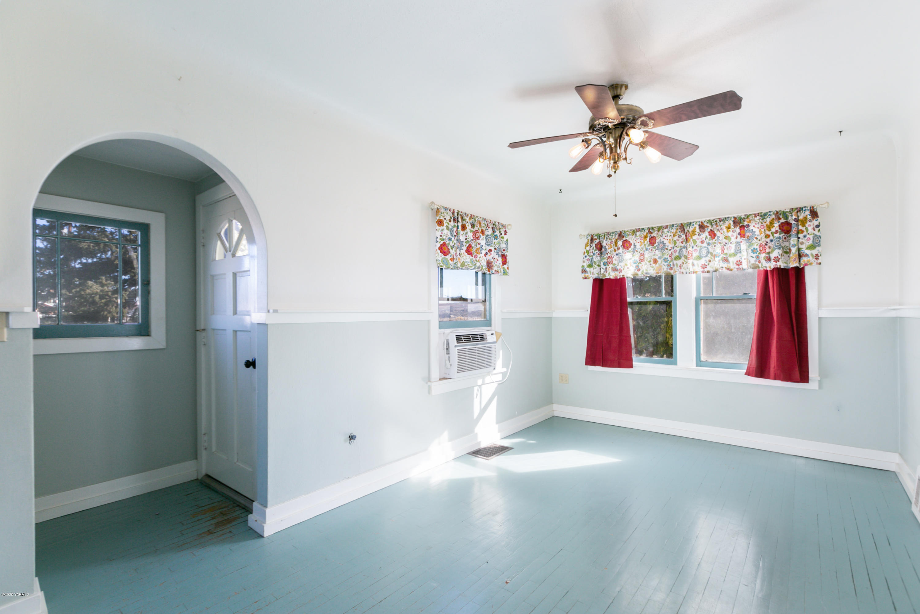 780 Elliott Road Cowiche, WA 98923 - Photo 8 of 18 wooden floor in an empty room with a window