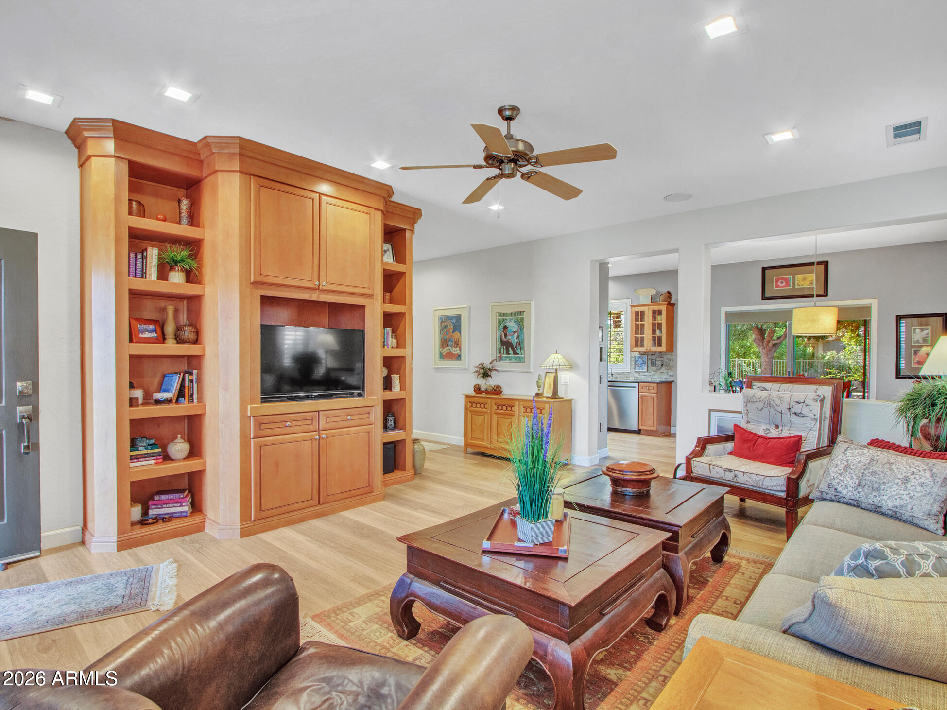 19760 North Los Altos Way Surprise, AZ 85374 - Photo 32 of 53 a living room with furniture and a flat screen tv