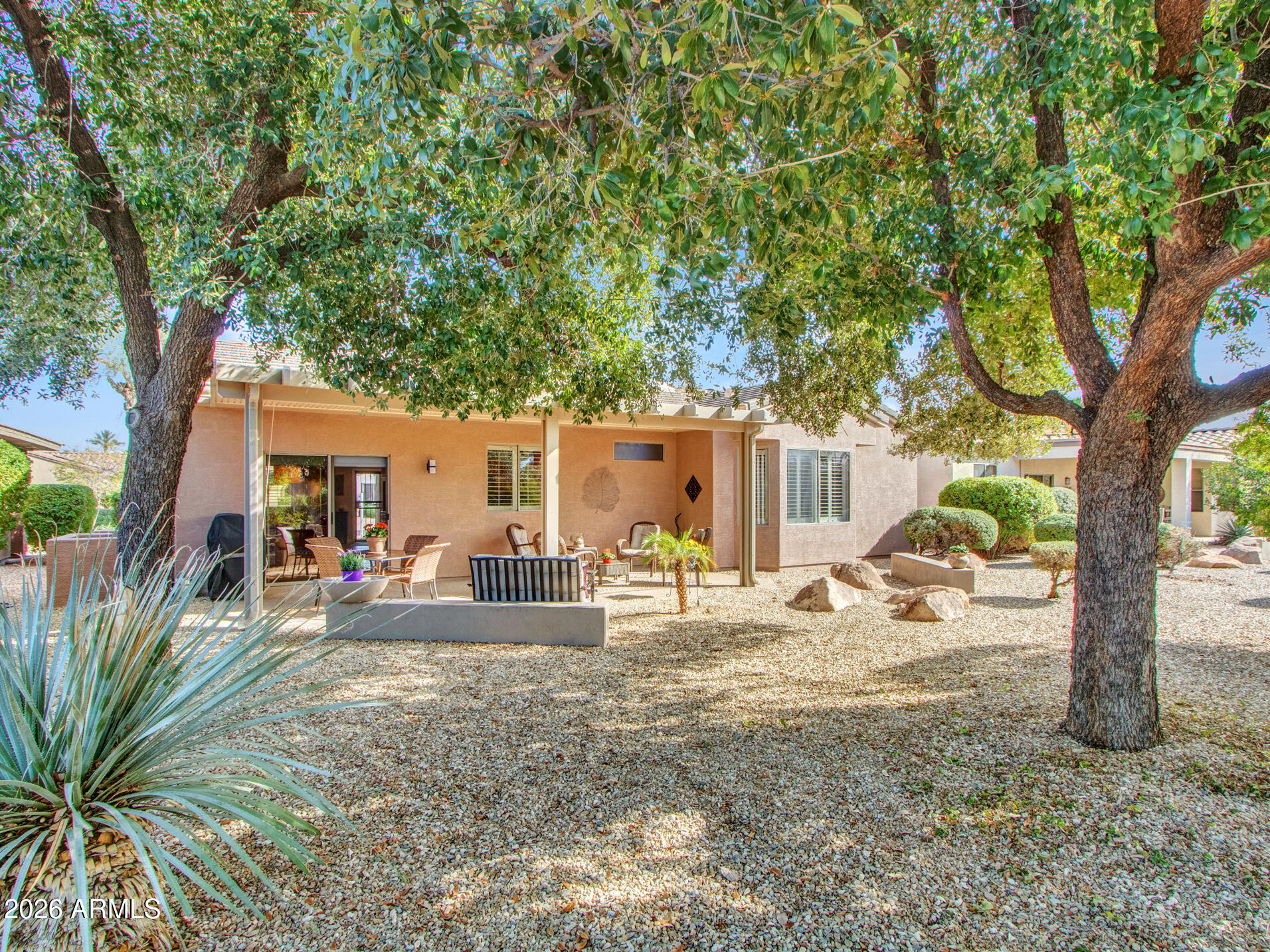 19760 North Los Altos Way Surprise, AZ 85374 - Photo 40 of 53 a view of a house with backyard porch and sitting area