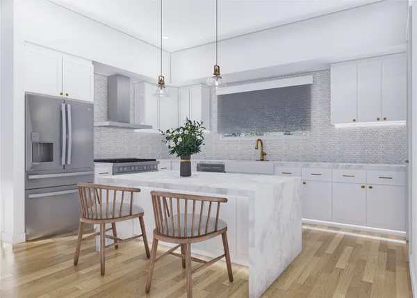 a kitchen with white cabinets and stainless steel appliances