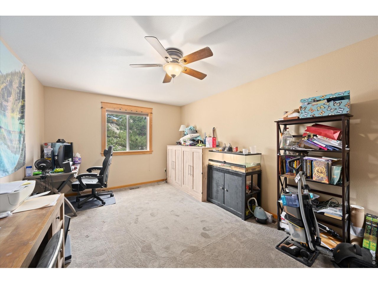 842 Unger Mountain Road Bellvue, CO 80512 - Photo 15 of 45 a workspace with furniture and window
