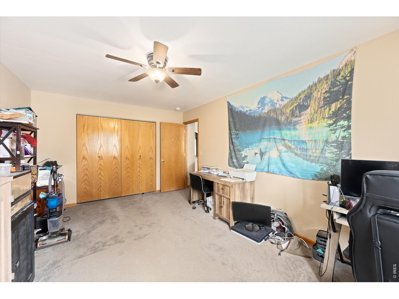 842 Unger Mountain Road Bellvue, CO 80512 - Photo 16 of 45 a living room with a couch and a window