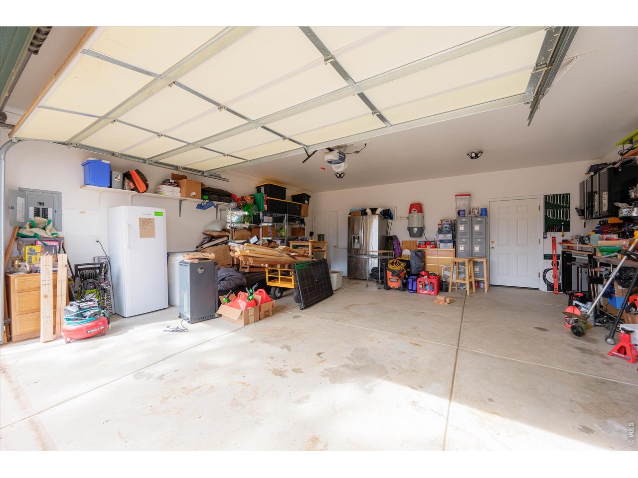 842 Unger Mountain Road Bellvue, CO 80512 - Photo 22 of 45 a view of a garage with rack and bicycle
