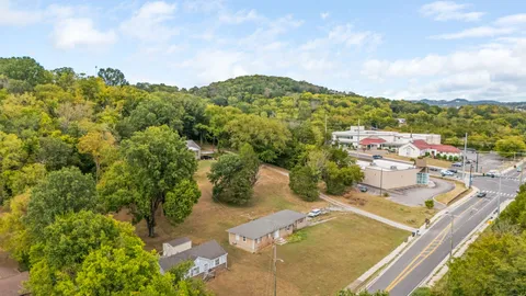 a view of a balcony with an outdoor seating