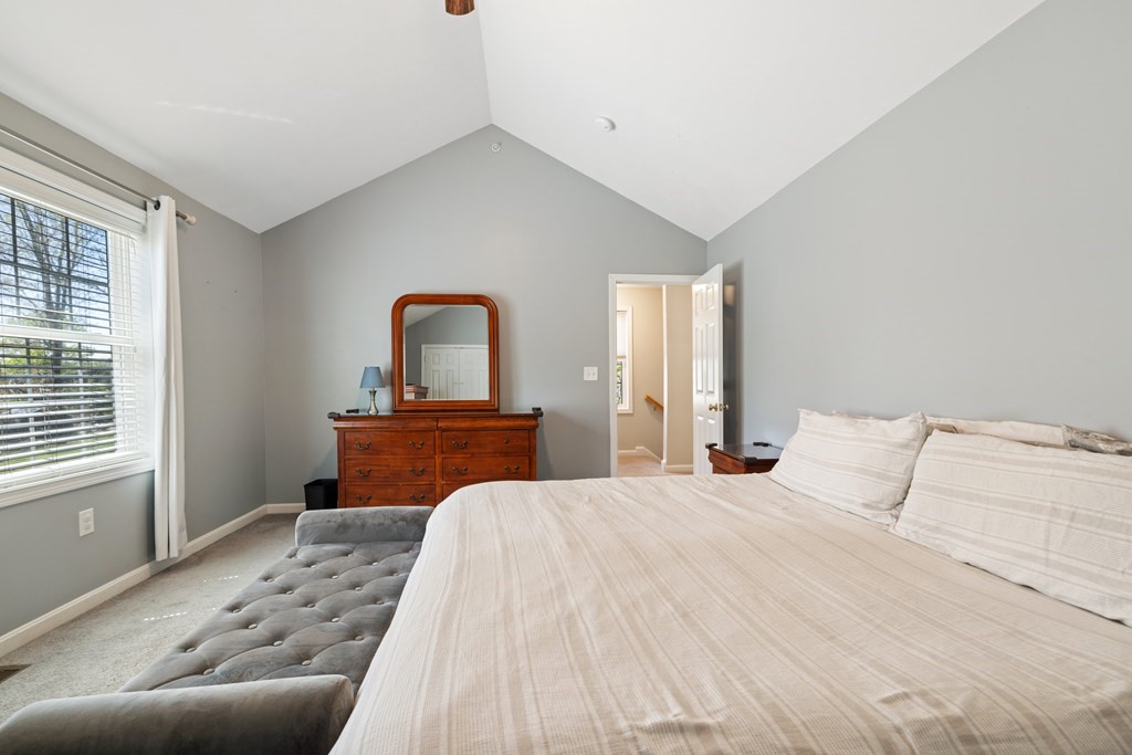 9 Evergreen Road Salem, NH 03079 - Photo 20 of 41 a bedroom with a large bed and a window