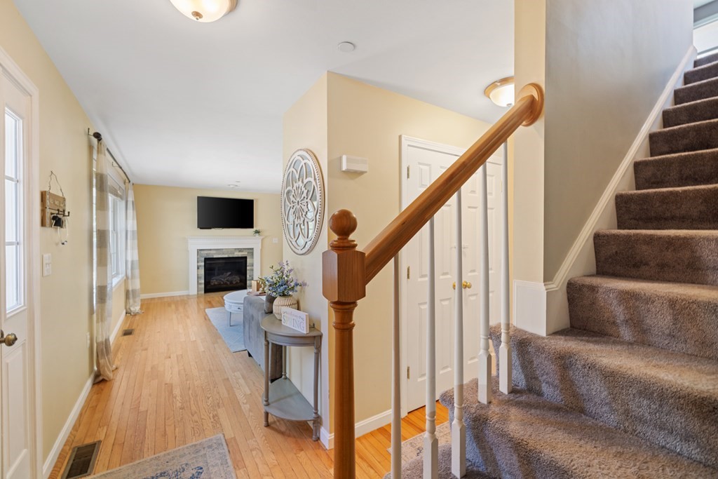 9 Evergreen Road Salem, NH 03079 - Photo 2 of 41 a view of entryway and hall with wooden floor