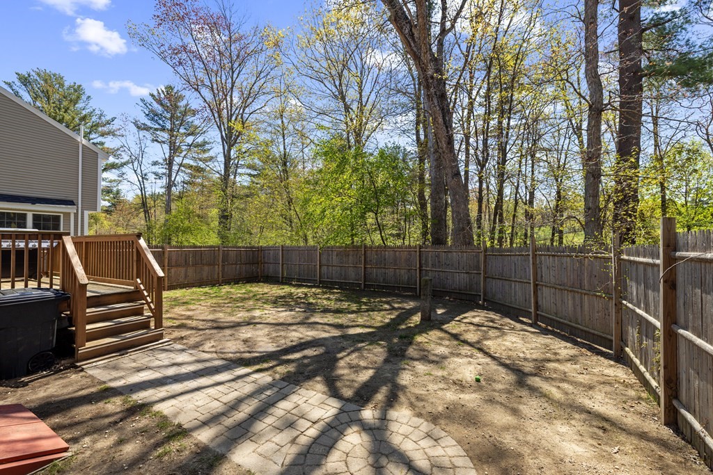 9 Evergreen Road Salem, NH 03079 - Photo 37 of 41 a view of a backyard with a tree