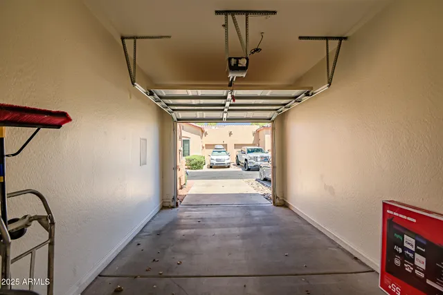 a view of hallway with furniture