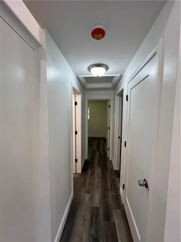 a bathroom with a granite countertop toilet sink and shower