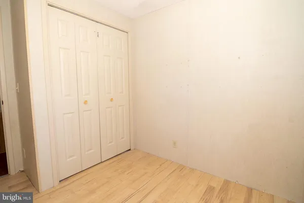 a view of a room with an empty space