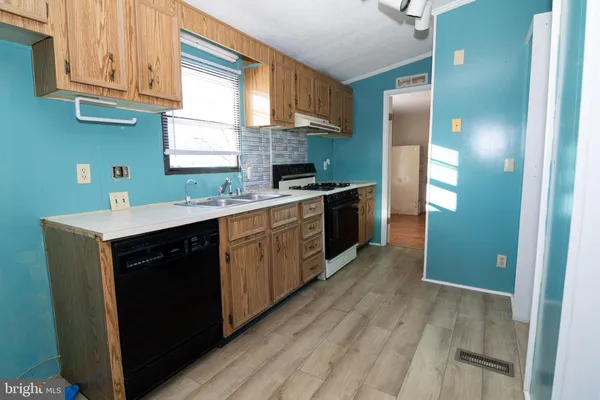 a view of a bathroom from a hallway