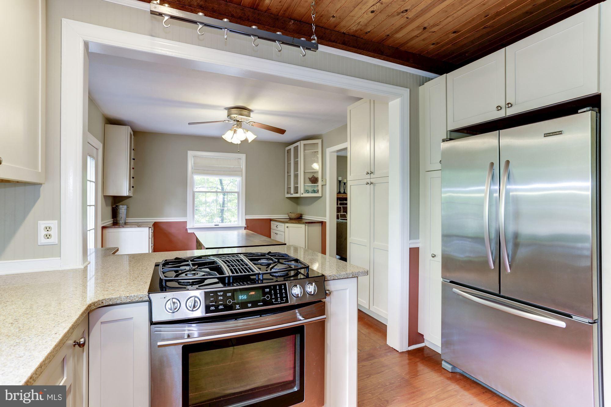 307 Old County Road Severna Park, MD 21146 - Photo 4 of 30 Stainless Appliances & Wood Plank Ceiling