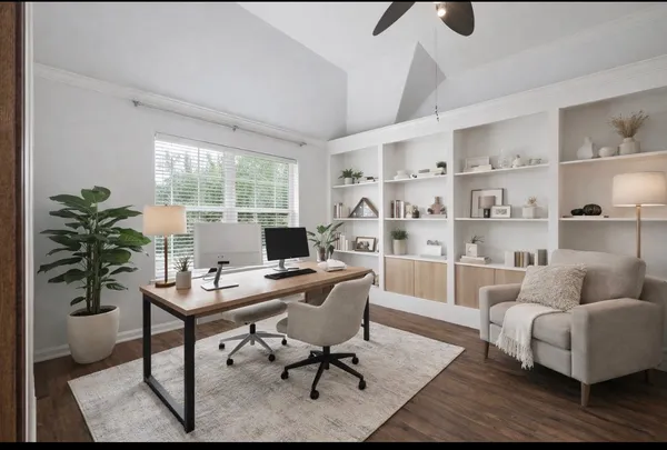 a workspace with furniture and a potted plant
