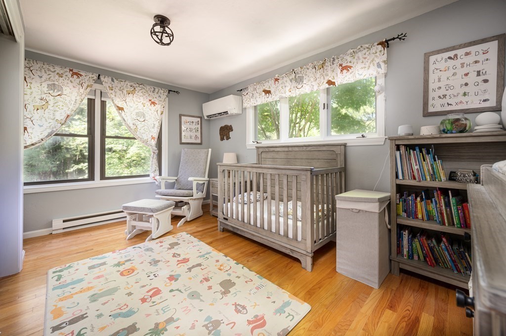 769 Mason Road Holden, MA 01522 - Photo 20 of 29 a bedroom with furniture window and book shelf