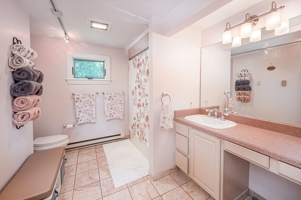 769 Mason Road Holden, MA 01522 - Photo 21 of 29 a spacious bathroom with a sink a toilet and shower