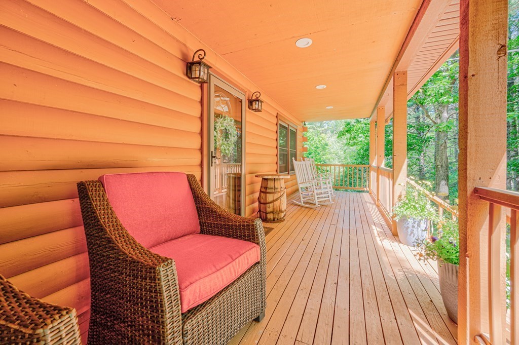 769 Mason Road Holden, MA 01522 - Photo 22 of 29 a balcony with wooden floor