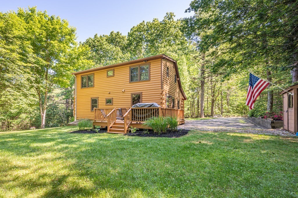 769 Mason Road Holden, MA 01522 - Photo 26 of 29 a view of a house with a backyard