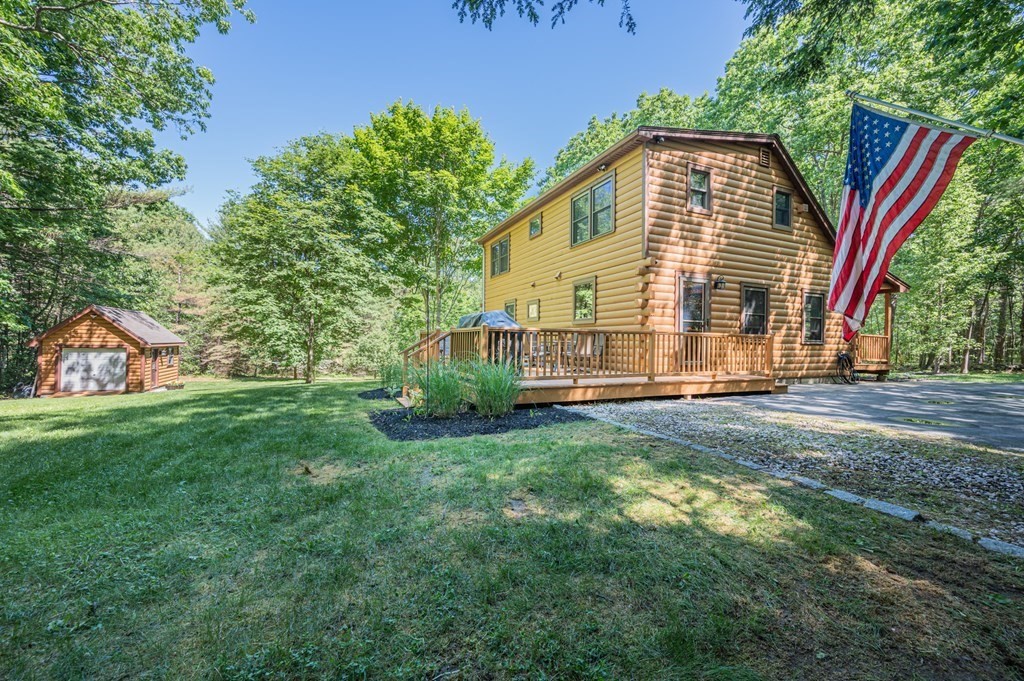 769 Mason Road Holden, MA 01522 - Photo 27 of 29 a front view of a house with yard and green space