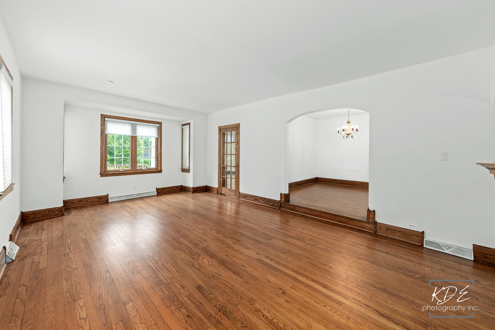 330 South Maple Street Itasca, IL 60143 - Photo 11 of 67 an empty room with wooden floor and windows