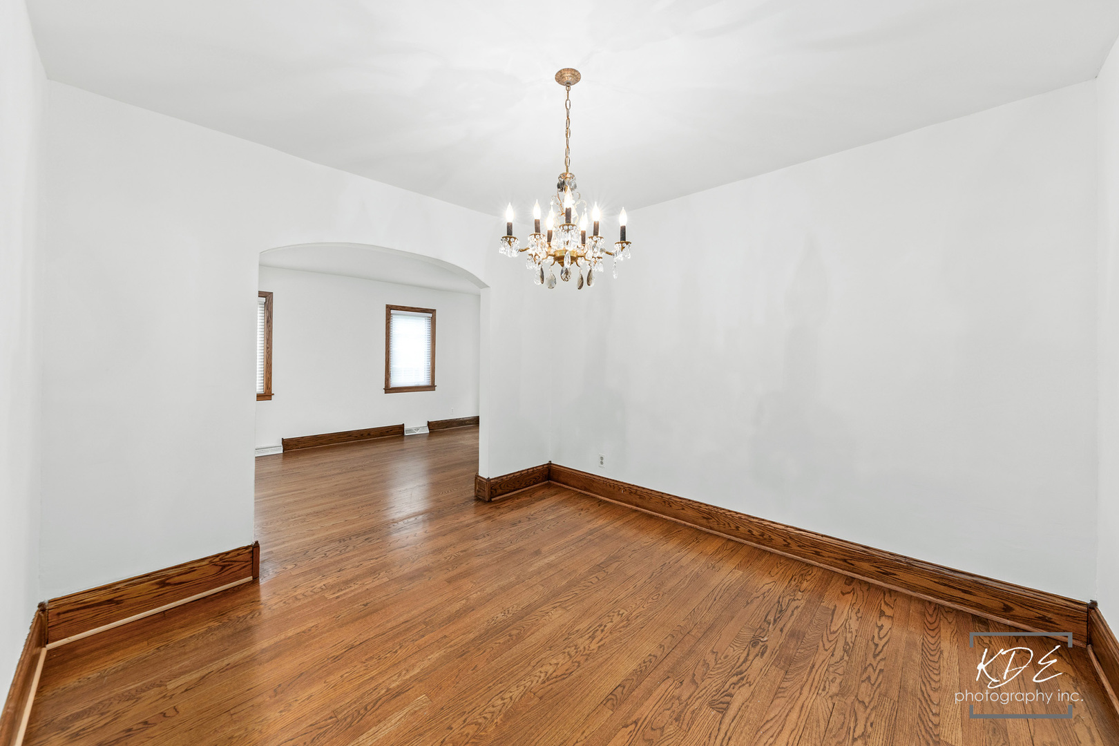 330 South Maple Street Itasca, IL 60143 - Photo 15 of 67 a view of a room with wooden floor and chandelier