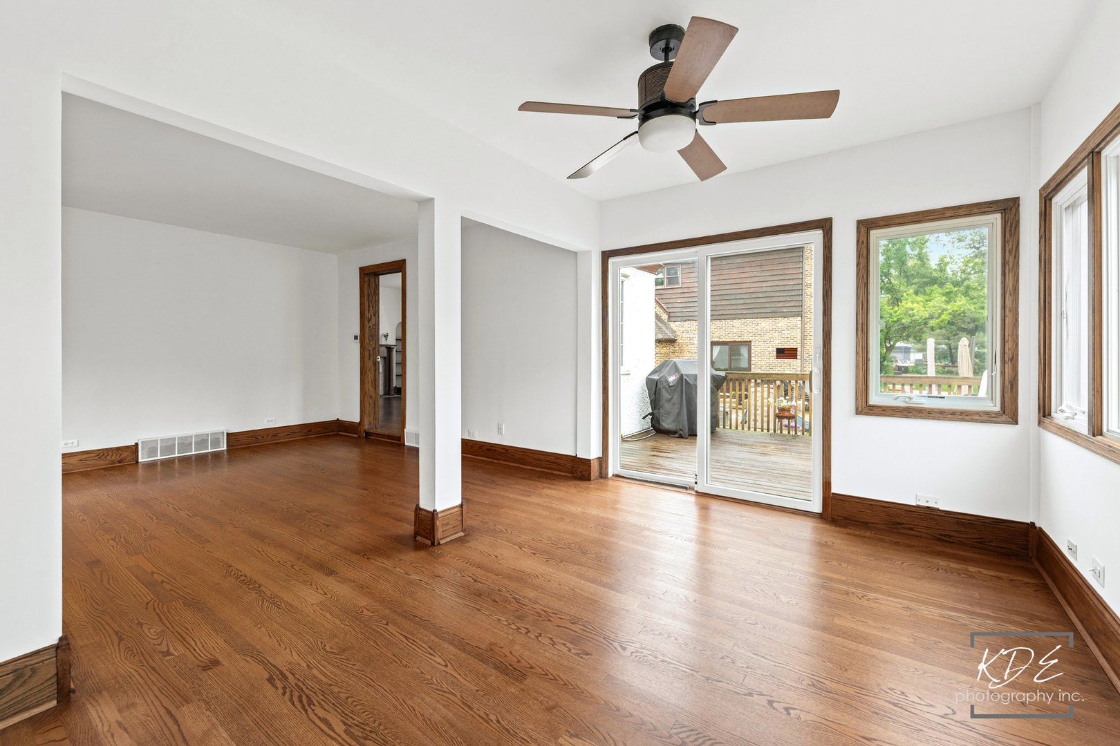 330 South Maple Street Itasca, IL 60143 - Photo 31 of 67 a view of empty room with wooden floor and fan