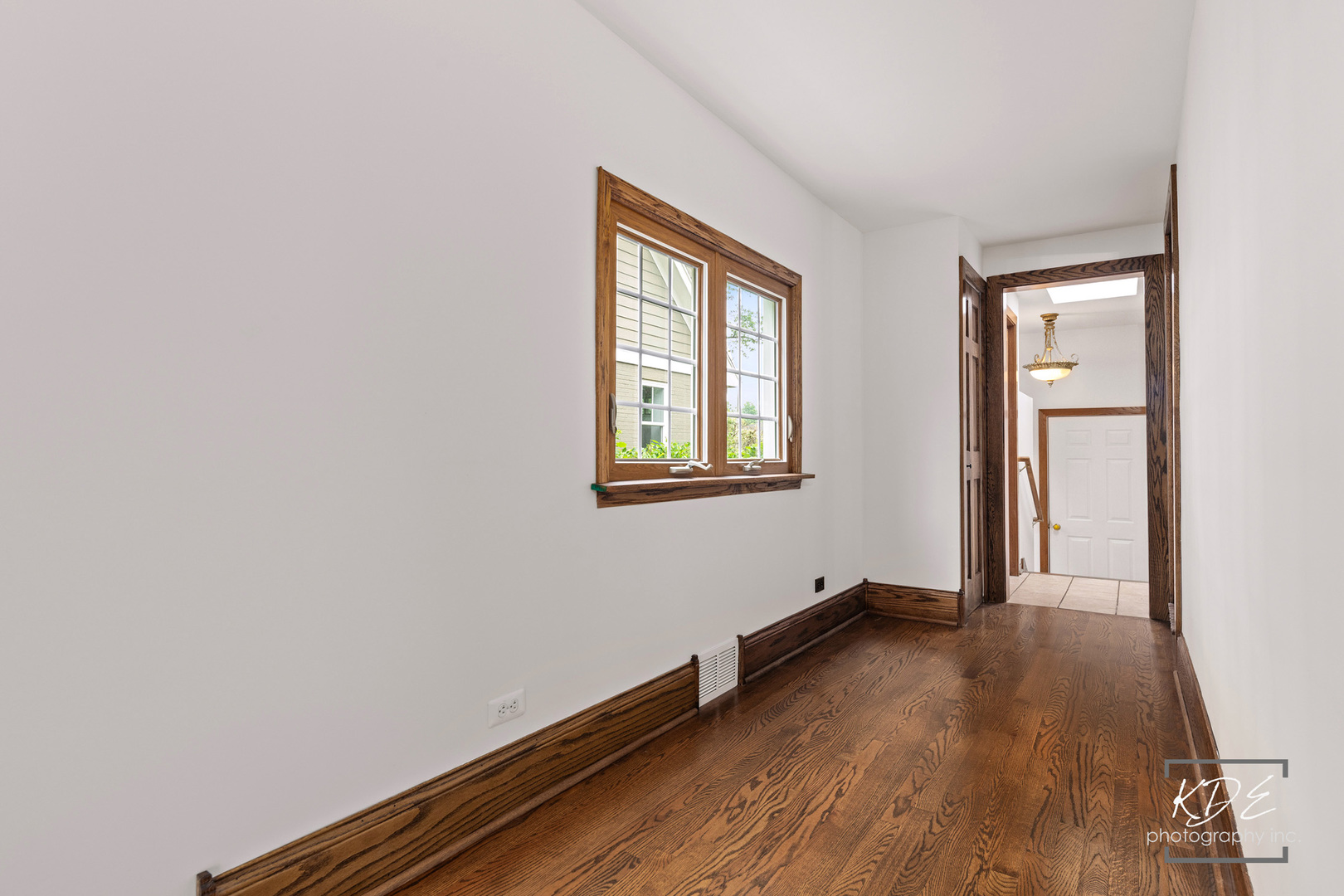 330 South Maple Street Itasca, IL 60143 - Photo 35 of 67 an empty room with wooden floor and windows