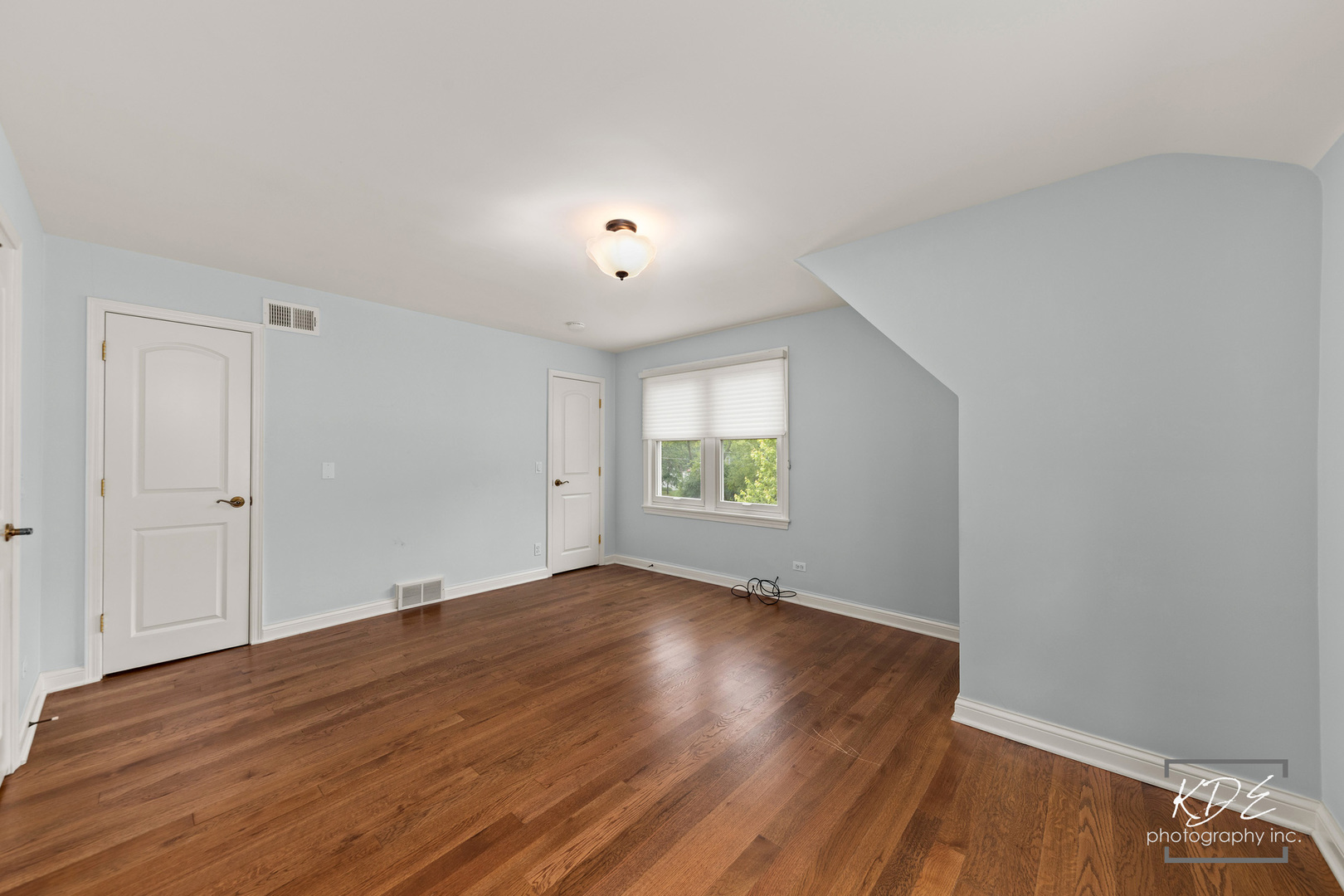 330 South Maple Street Itasca, IL 60143 - Photo 40 of 67 an empty room with wooden floor and windows