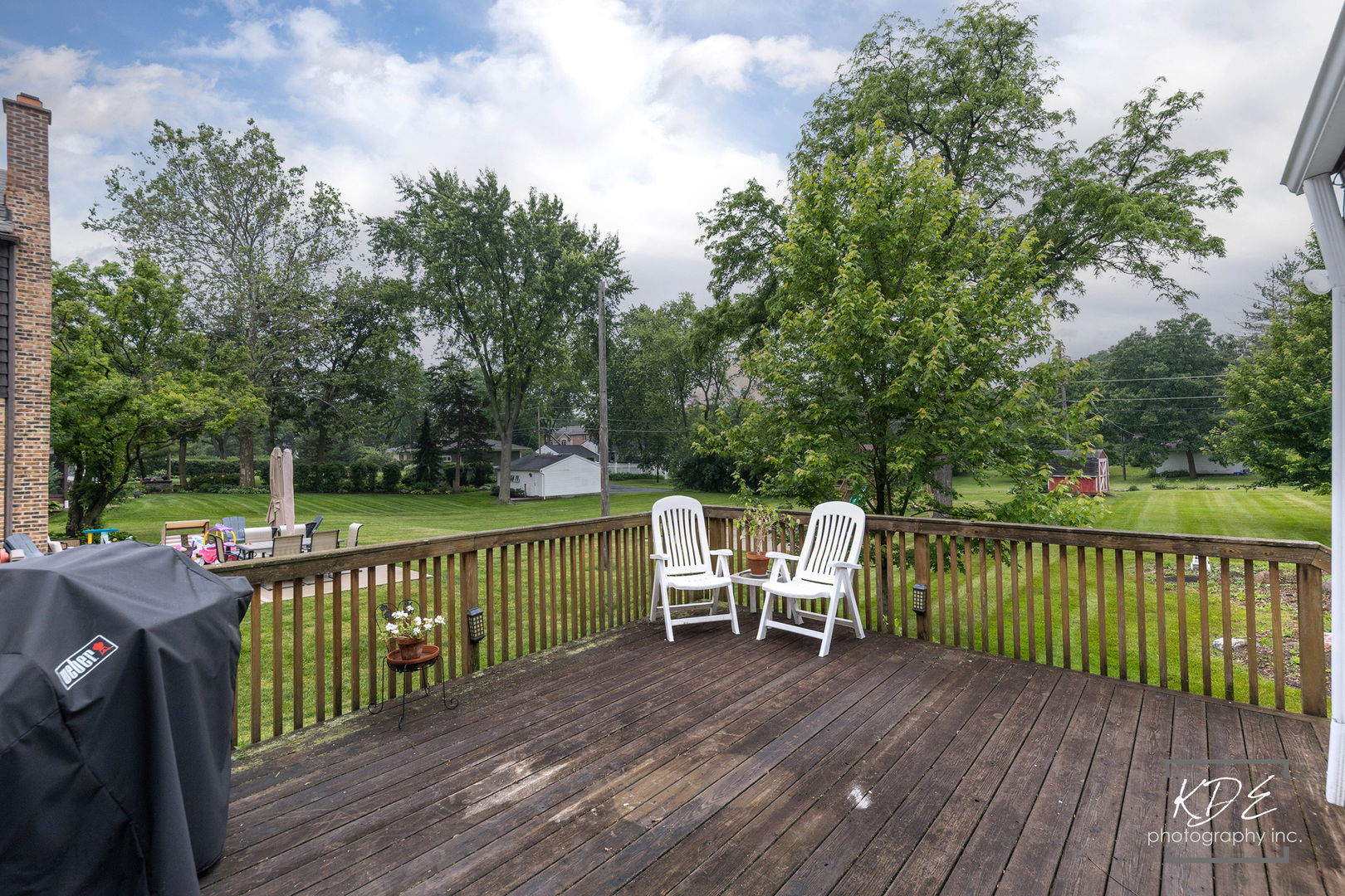 330 South Maple Street Itasca, IL 60143 - Photo 55 of 67 a view of a deck with two chairs and a yard