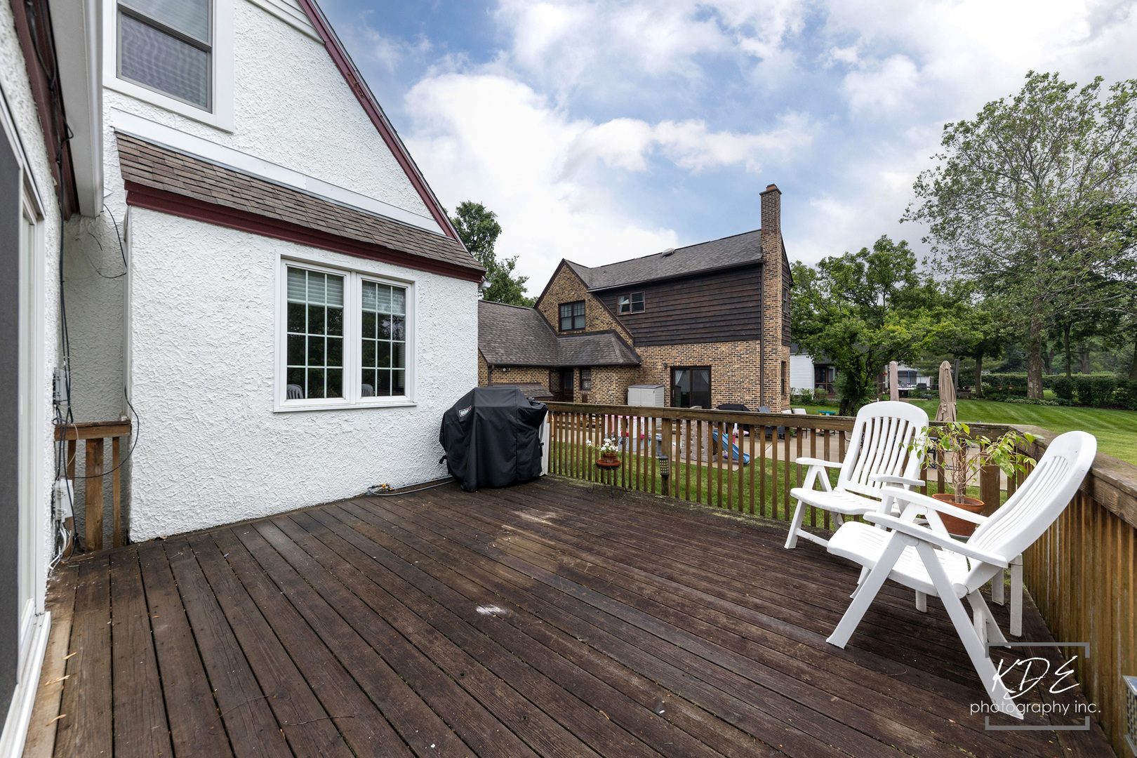 330 South Maple Street Itasca, IL 60143 - Photo 56 of 67 a view of a chair and table on the wooden deck