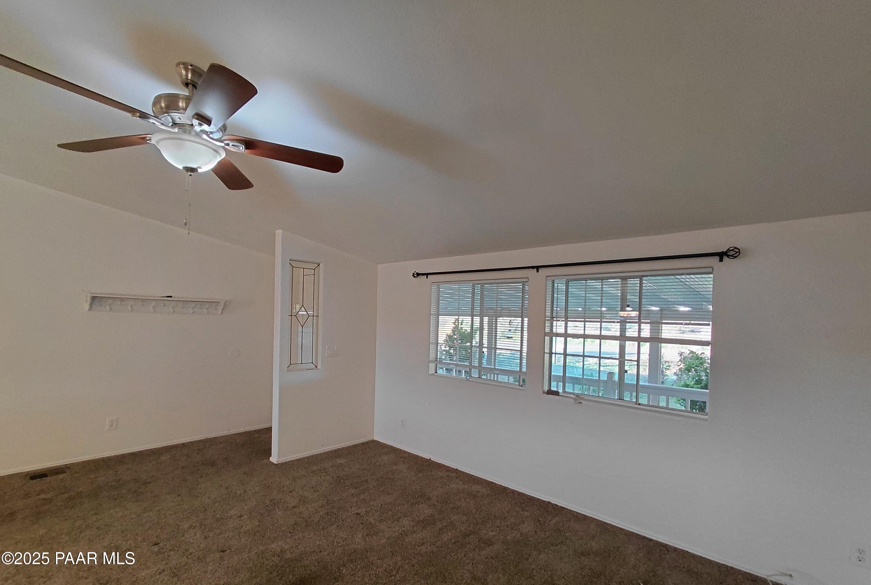 17351 East Bob White Road Mayer, AZ 86333 - Photo 13 of 54 a view of an empty room with a window
