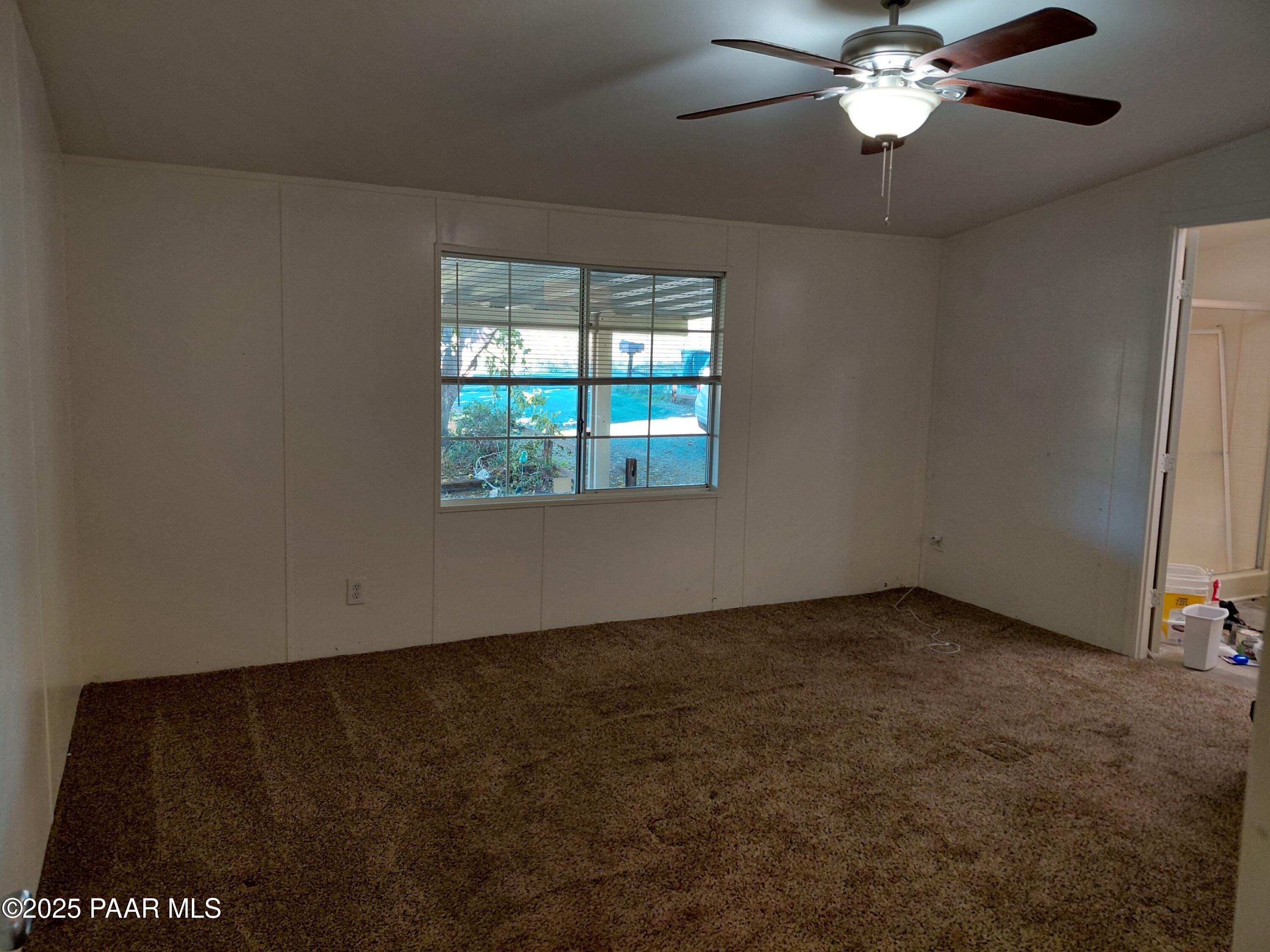 17351 East Bob White Road Mayer, AZ 86333 - Photo 27 of 54 an empty room with a window
