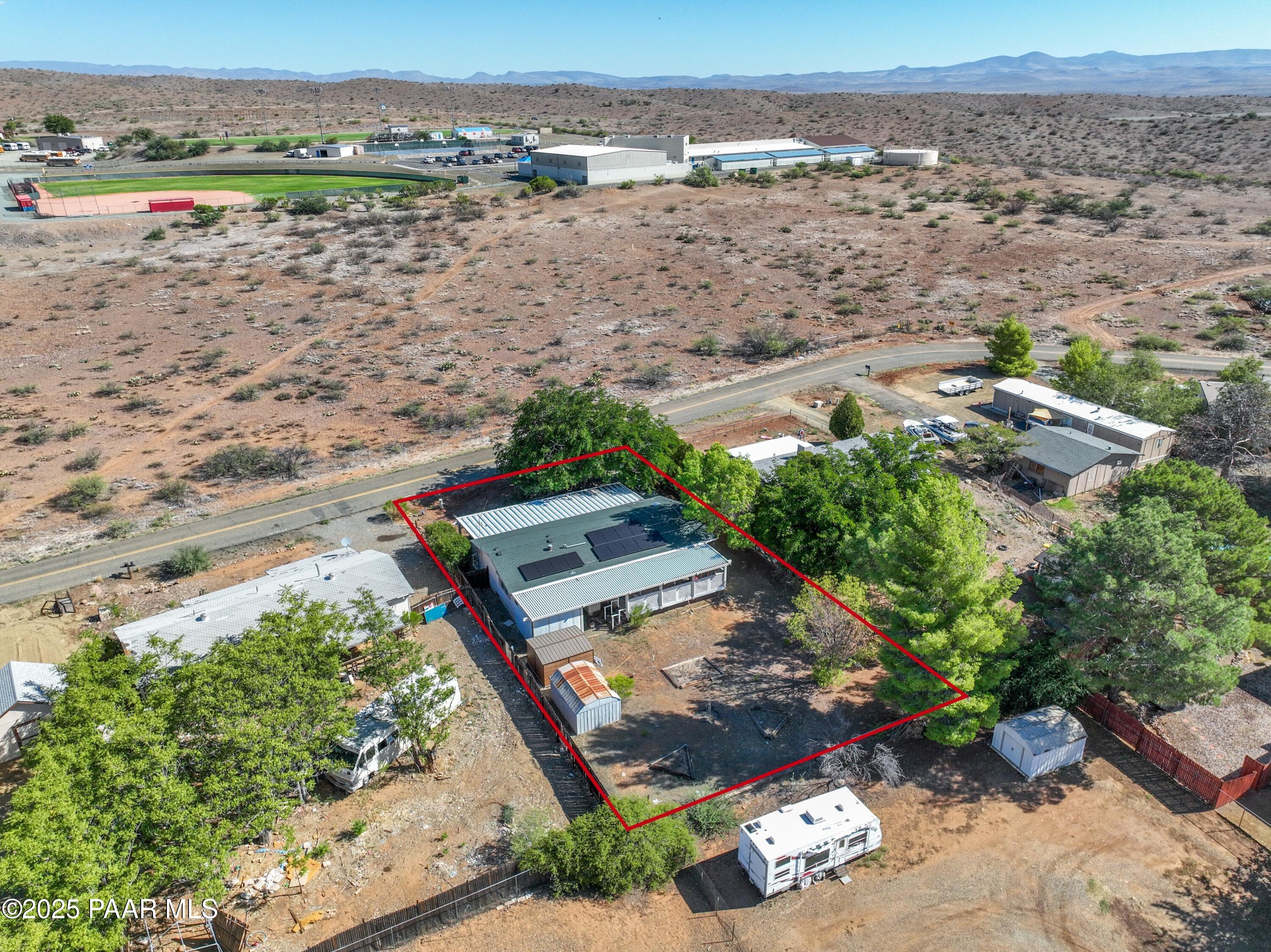 17351 East Bob White Road Mayer, AZ 86333 - Photo 7 of 54 an aerial view of a house with a yard