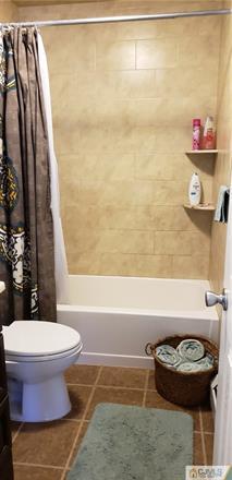 631 Magnolia Road North Brunswick, NJ 08902 - Photo 15 of 20 a bathroom with a toilet and a shower