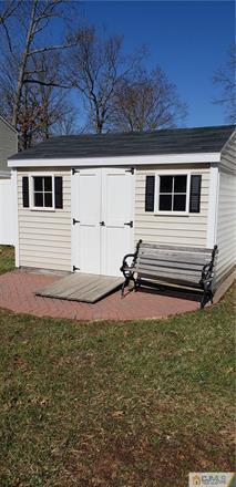 631 Magnolia Road North Brunswick, NJ 08902 - Photo 3 of 20 a front view of a house with a yard