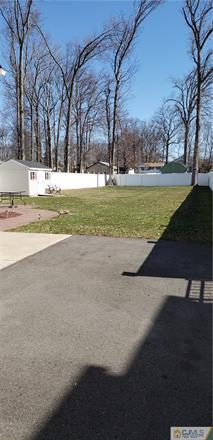 631 Magnolia Road North Brunswick, NJ 08902 - Photo 5 of 20 a view of road with yard