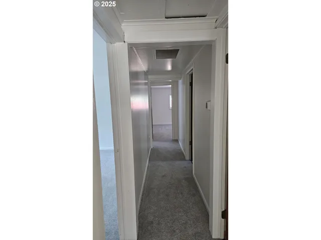 a open hall with a bench