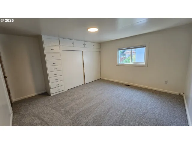 a open kitchen with a window