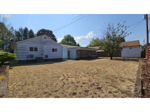 a view of a room with a large window
