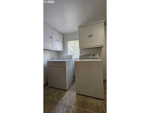 a view of a hallway with a white walls