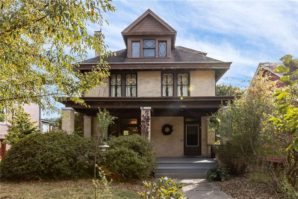 1139 Davis Avenue Pittsburgh, PA 15212 - Photo 1 of 35 a front view of a house with garden