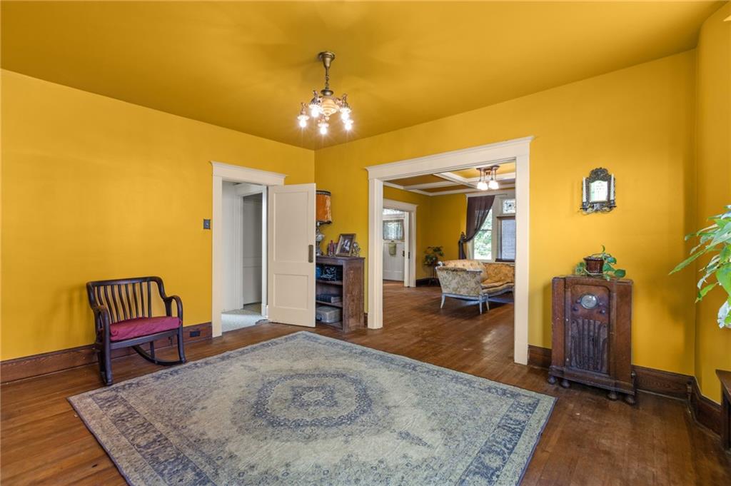 1139 Davis Avenue Pittsburgh, PA 15212 - Photo 11 of 35 a view of a livingroom with furniture and a hallway