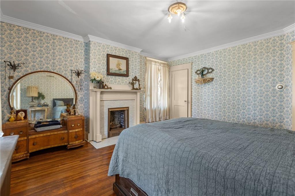 1139 Davis Avenue Pittsburgh, PA 15212 - Photo 21 of 35 a living room with furniture and a fireplace