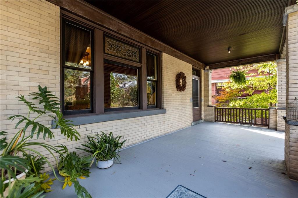 1139 Davis Avenue Pittsburgh, PA 15212 - Photo 3 of 35 a view of a porch with wooden floor