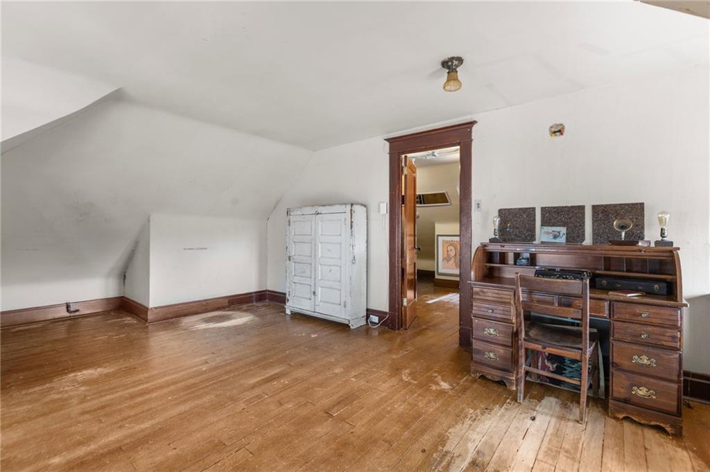 1139 Davis Avenue Pittsburgh, PA 15212 - Photo 31 of 35 a view of a livingroom with furniture and wooden floor