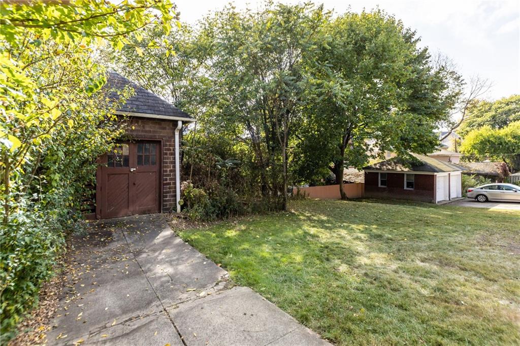 1139 Davis Avenue Pittsburgh, PA 15212 - Photo 35 of 35 a front view of a house with a yard