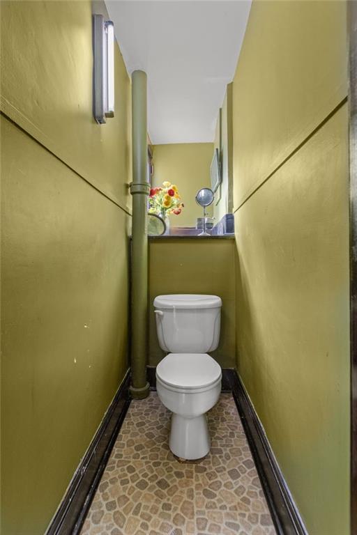 1139 Davis Avenue Pittsburgh, PA 15212 - Photo 7 of 35 a bathroom with a toilet and a sink